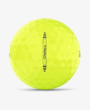 Wilson 2022 Triad golf balls with three-piece construction and vibrant white design, shown in close-up view.