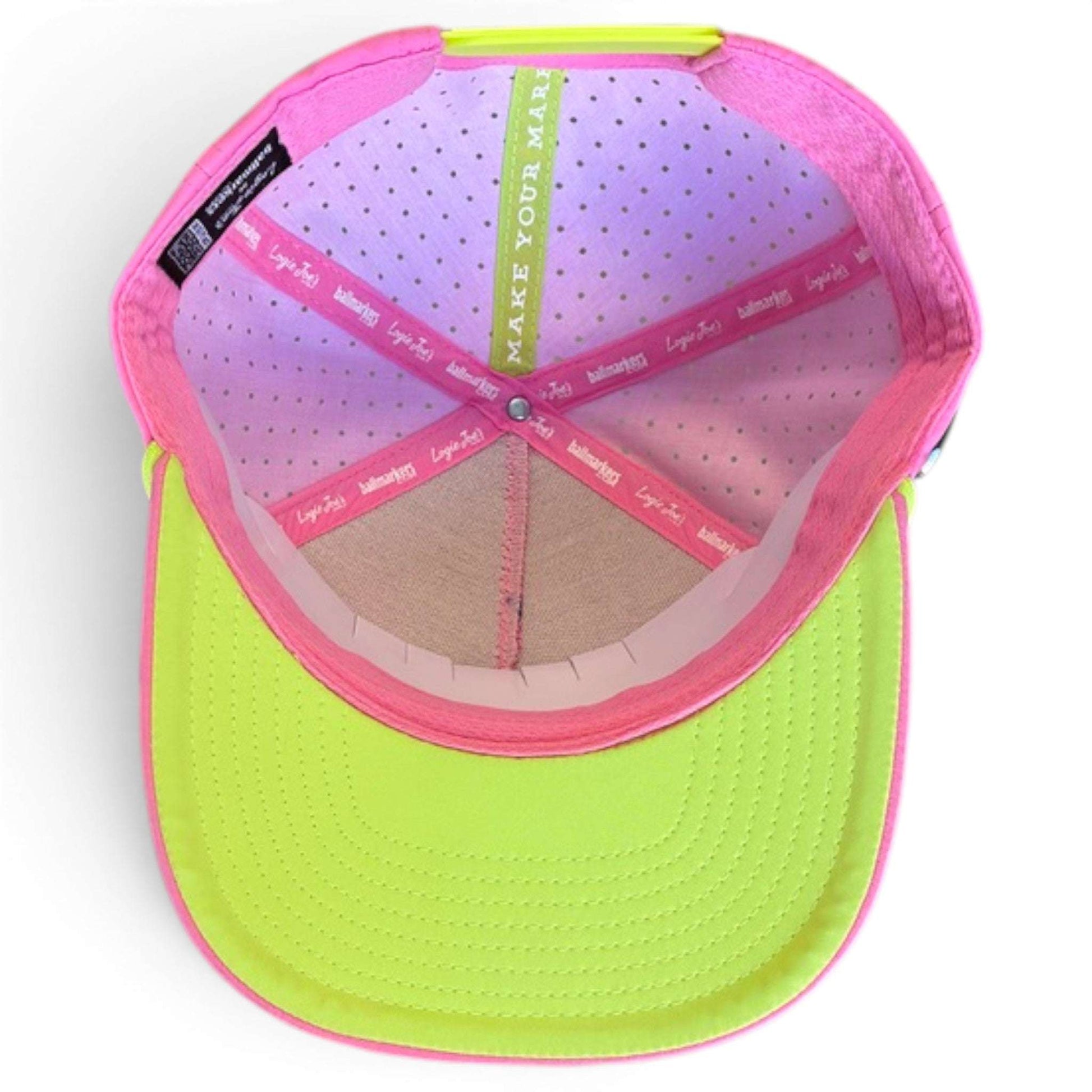 Logie Joe's Golf coconut cocktail snapback hat with built-in magnetic ball marker holder, adjustable strap, and colorful coconut design.