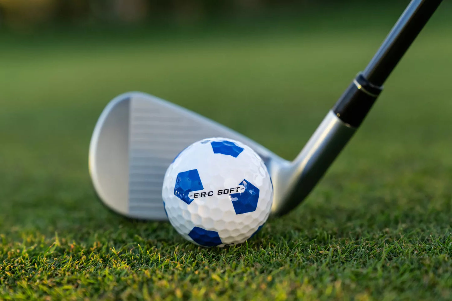Callaway 2025 ERC Soft Truvis golf balls with bright red and black Truvis pattern, shown in a close-up view.