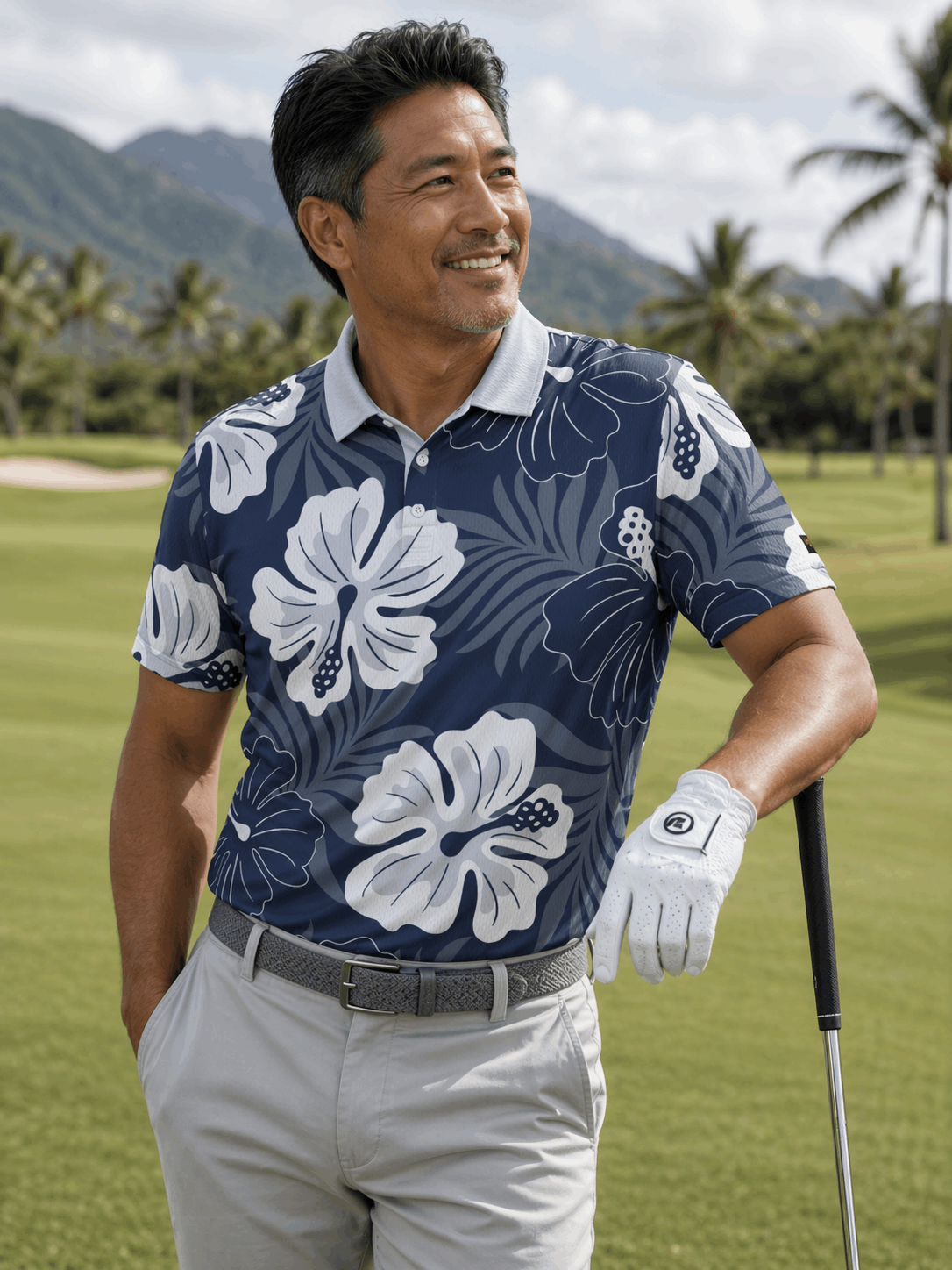 Men's Tropical Oasis performance golf polo by Iron Sight Golf featuring vibrant tropical print and breathable fabric for active wear.