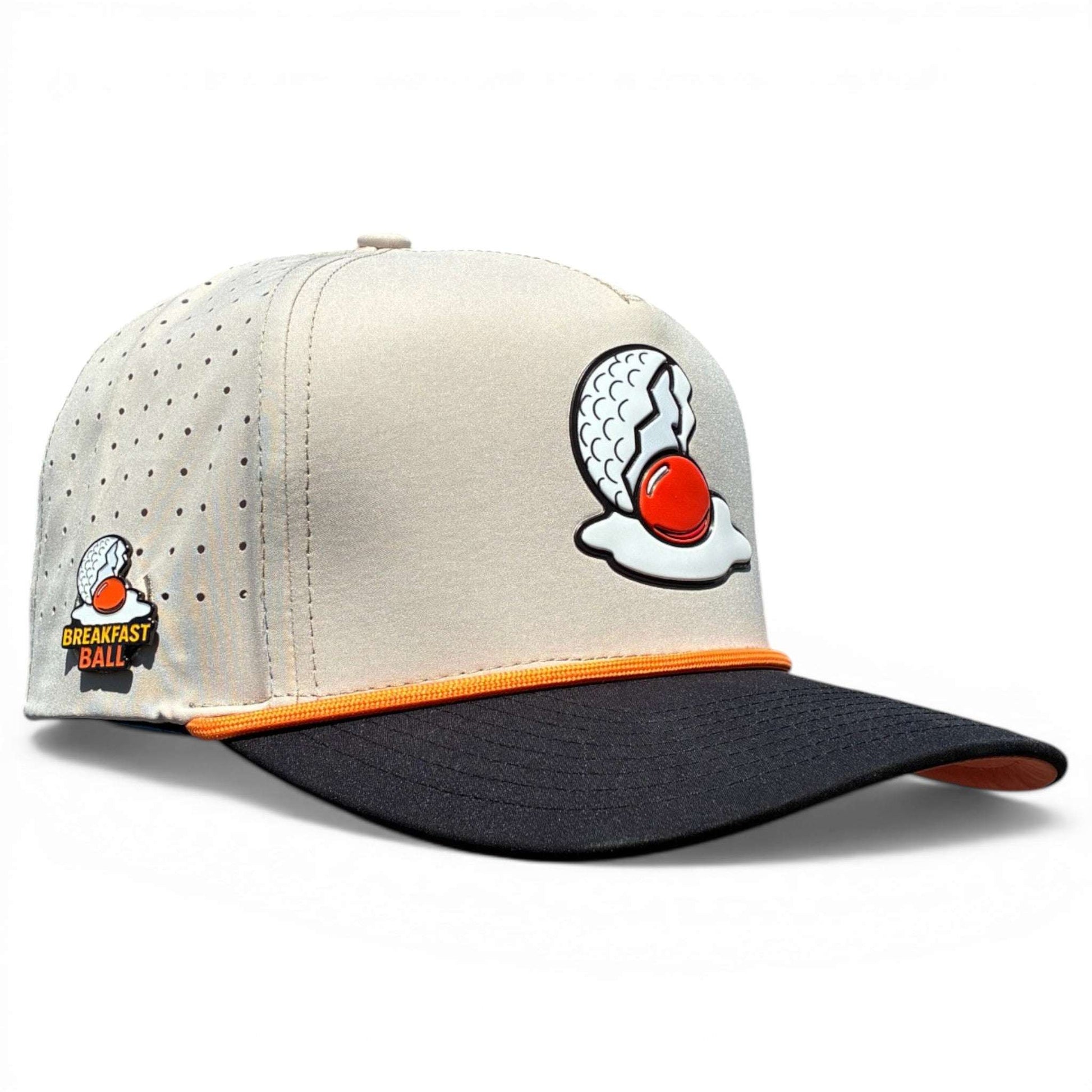 Logie Joe's Golf Breakfast Ball snapback hat with built-in magnetic ball marker holder and marker, adjustable tan cap.