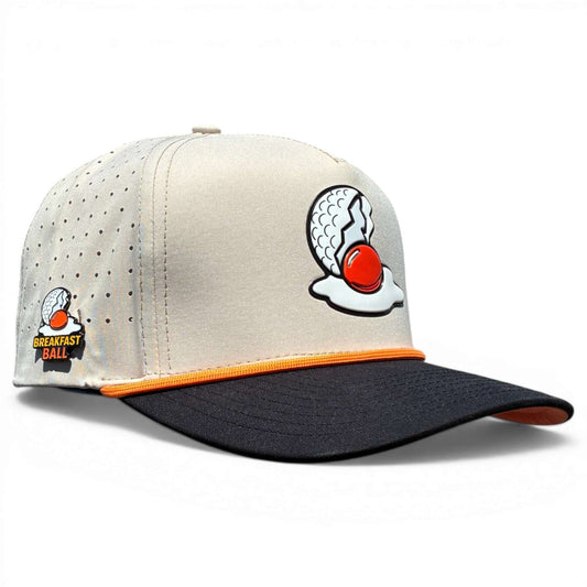 Logie Joe's Golf Breakfast Ball snapback hat with built-in magnetic ball marker holder and marker, adjustable tan cap.