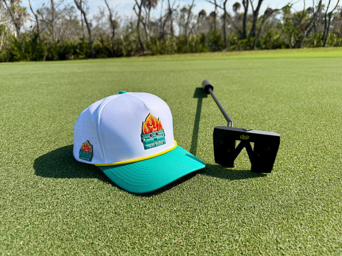 Dumpster Fire golf hat by Logie Joe's Golf, white and teal snapback cap with built-in magnetic ball marker holder and adjustable fit.