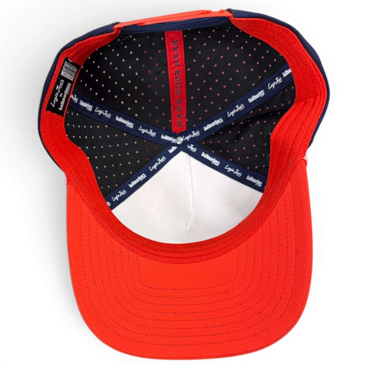 Freedom Flight golf hat by Logie Joe's Golf featuring a red, white, and blue USA eagle design with adjustable snapback and magnetic ball marker holder