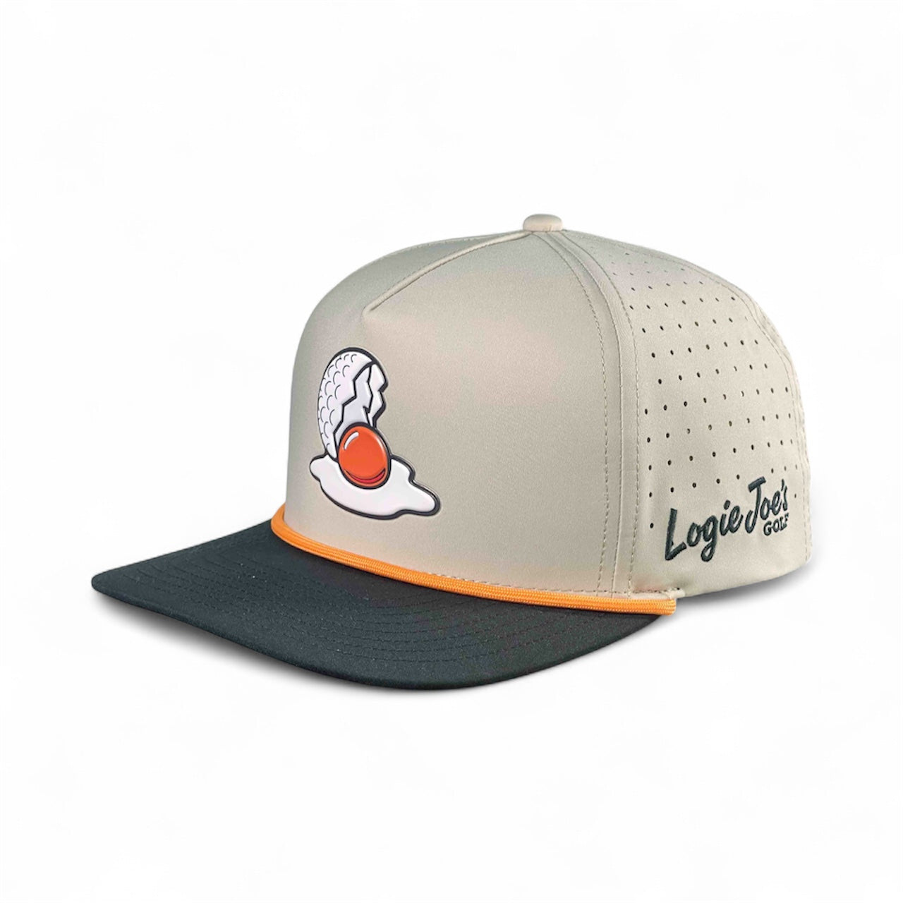 Logie Joe's Golf Breakfast Ball snapback hat with built-in magnetic ball marker holder and adjustable strap in tan color.