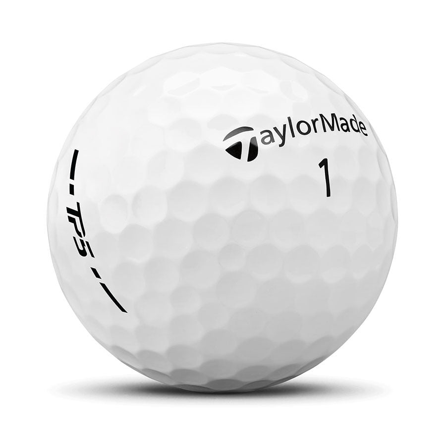 TaylorMade 2024 TP5 golf balls with sleek white design and branding, arranged on a golf course green.